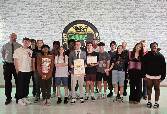 Students at Bash High School display the $1,500 grant their teacher, Glenda Skalitzky, received for multimedia equipment.